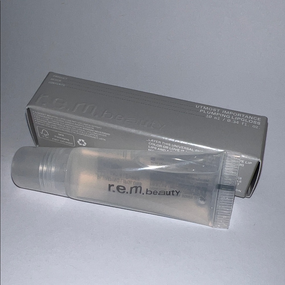 R.E.M Beauty by Ariana Grande Utmost Importance Plumping Lip Gloss New in box